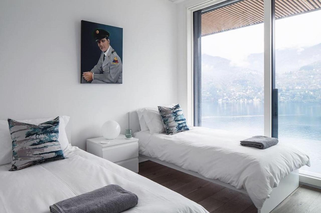 Appartement Ulivi Luxury Loft & Pool - The House Of Travelers à Carate Urio Extérieur photo